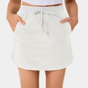 Halara High Waisted Drawstring Side Pocket 2-in-1 Curved Hem Mini Golf Skirt S